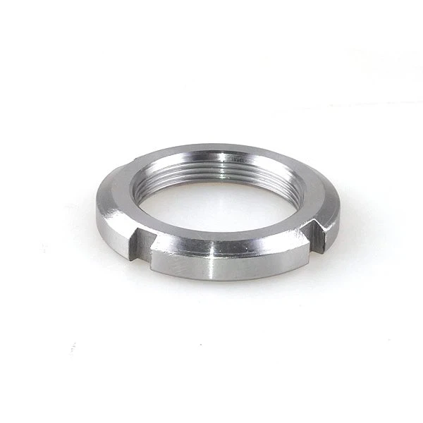 Išpjova fiksavimo veržlė